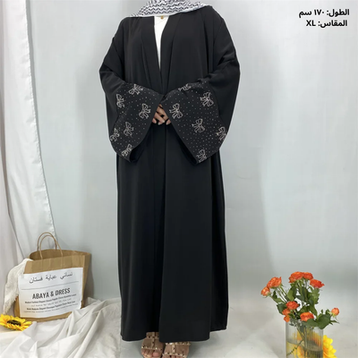 عباءة فاخرة بأكمام مطرزة أنيقة