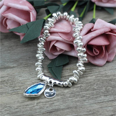 Crystal bracelet with silver-covered pearls