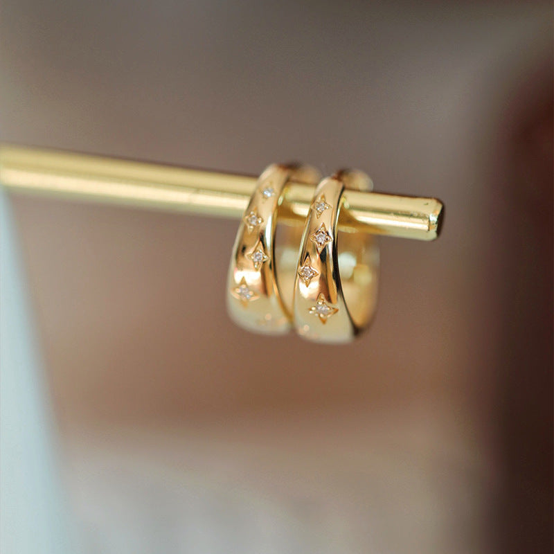 أقراط فاخرة من الذهب والفضة