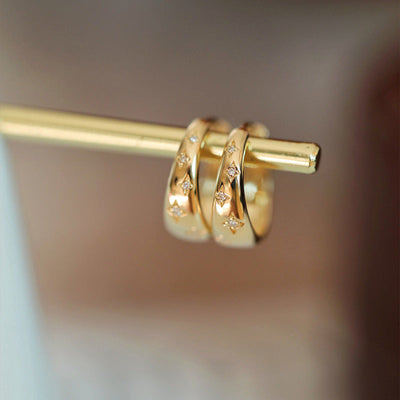 أقراط فاخرة من الذهب والفضة