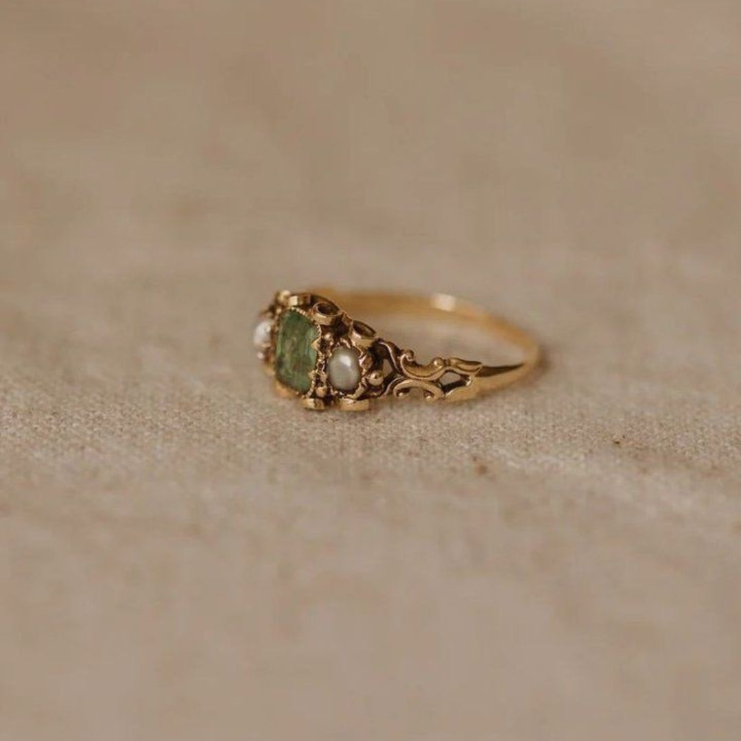 Green and gold pearl ring