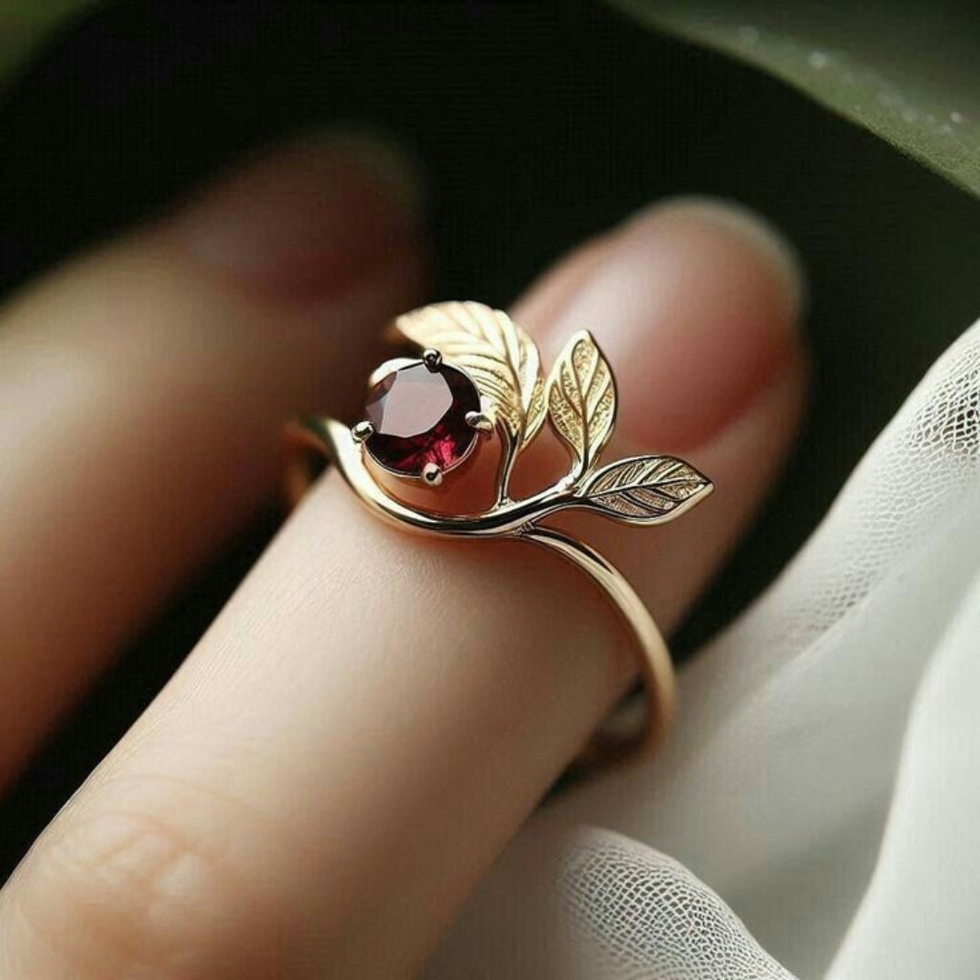 Gold plated platinum ring with red crystal