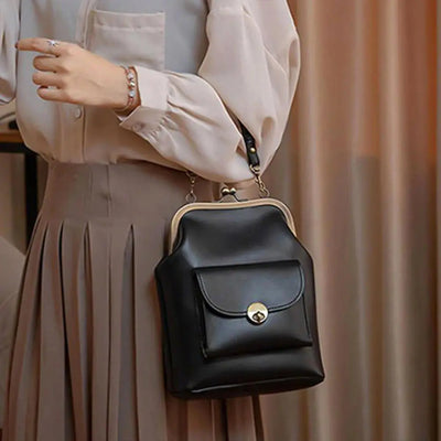 Anna - Elegant leather bag with snap closure