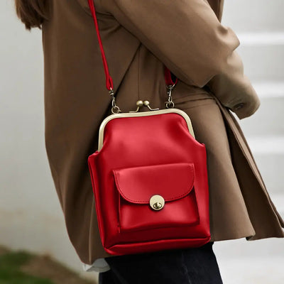 Anna - Elegant leather bag with snap closure