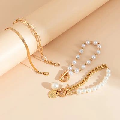 Elegant 4-Piece Bracelet Set - Snake, Pearl, and Links | Gold