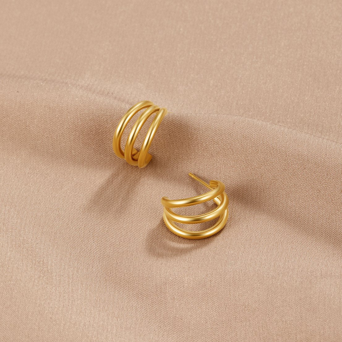 Triple gold earrings