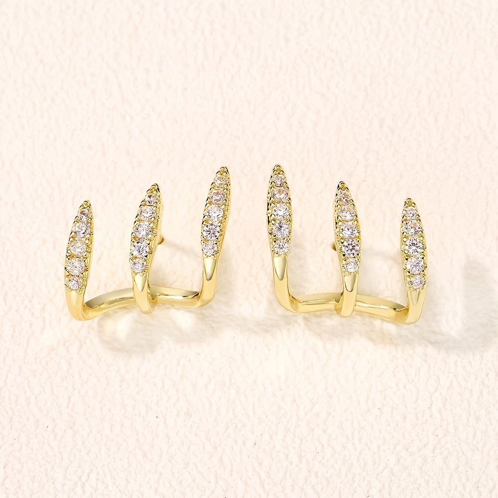 أقراط أنيقة مزينة بالأحجار الكريمة بثلاثة مخالب