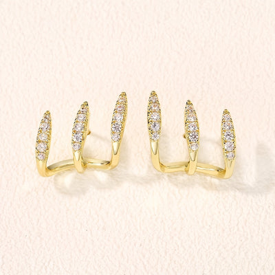 أقراط أنيقة مزينة بالأحجار الكريمة بثلاثة مخالب