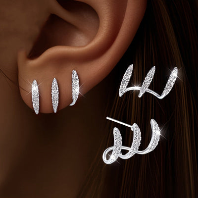 أقراط أنيقة مزينة بالأحجار الكريمة بثلاثة مخالب