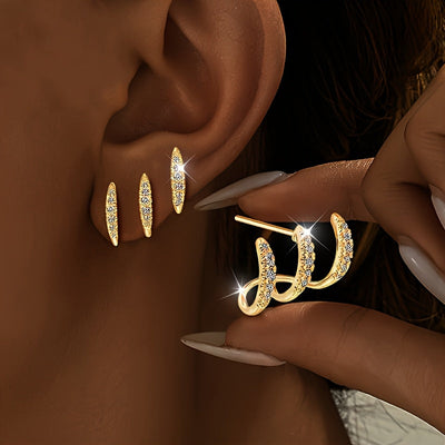 أقراط أنيقة مزينة بالأحجار الكريمة بثلاثة مخالب