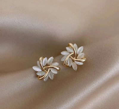 Elegant and sophisticated opal petal hoop earrings in gold