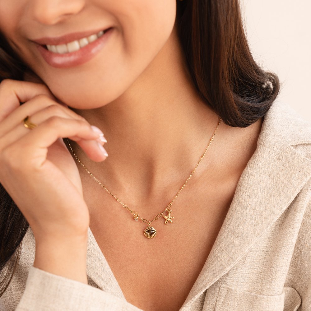 قلادة صدفة ذهبية ونجم البحر