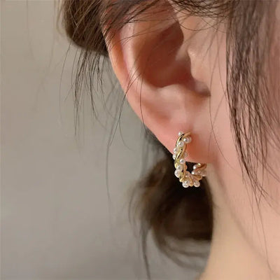Elegant round pearl earrings with embellishments