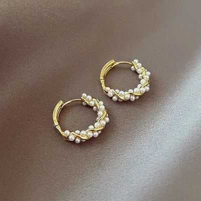Elegant round pearl earrings with embellishments