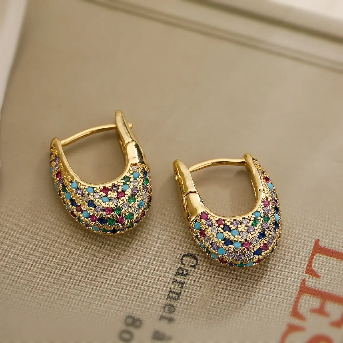 Elegant colorful earrings with studded crystals