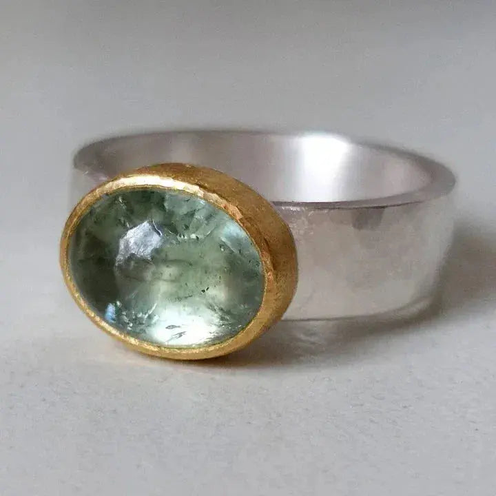 Green ring with a round stone, antique 