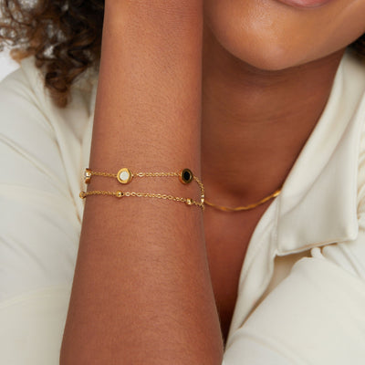 Onyx and white stone bracelet