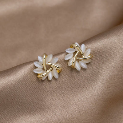 Gold earrings with opal flowers