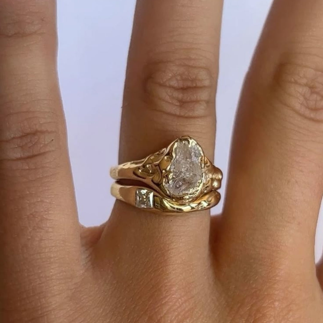 Polished gold ring with a shiny coating