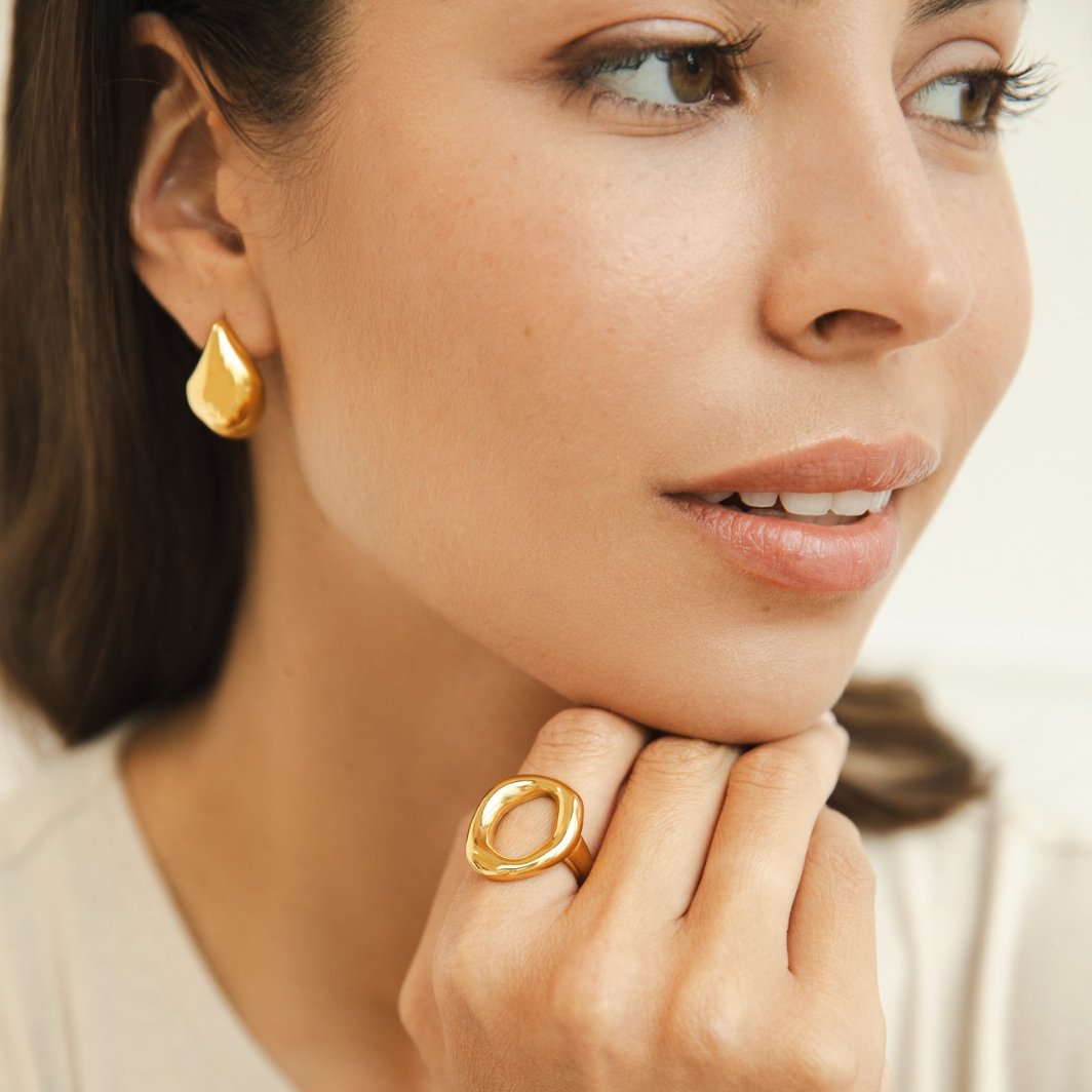 A gold ring melted in us
