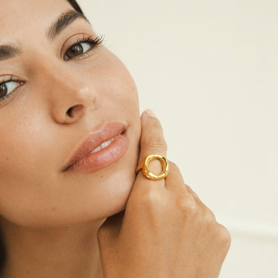 A gold ring melted in us