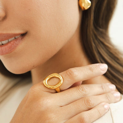 A gold ring melted in us